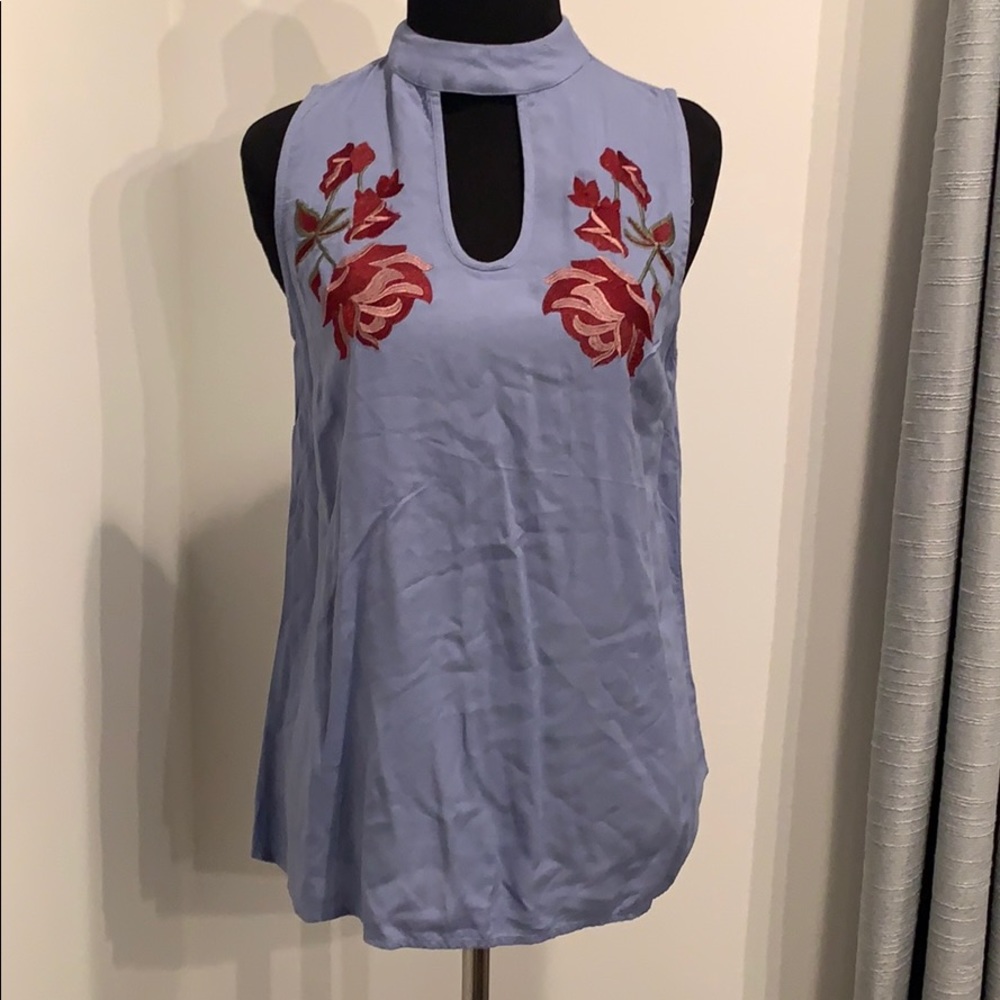 Francesca’s shirt size XS.
